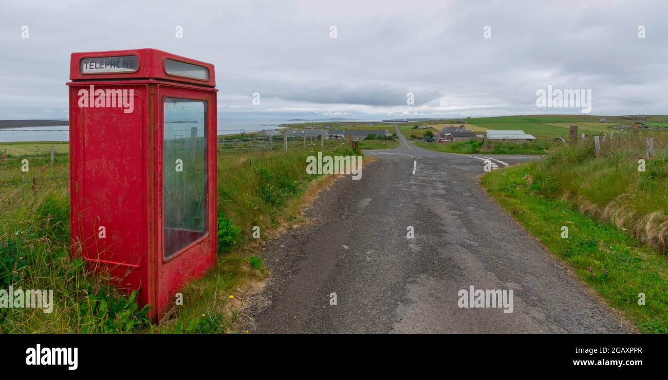 Old red telephone box, Isle of Flotta, Orkney isles Stock Photo