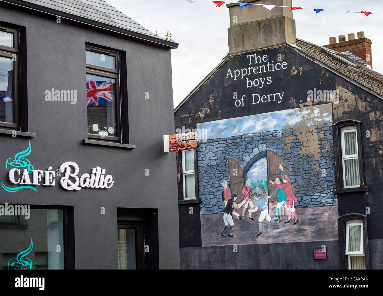 Londonderry, Northern Ireland, July, 2016. Derry city residential buildings with wall paintings. Stock Photo