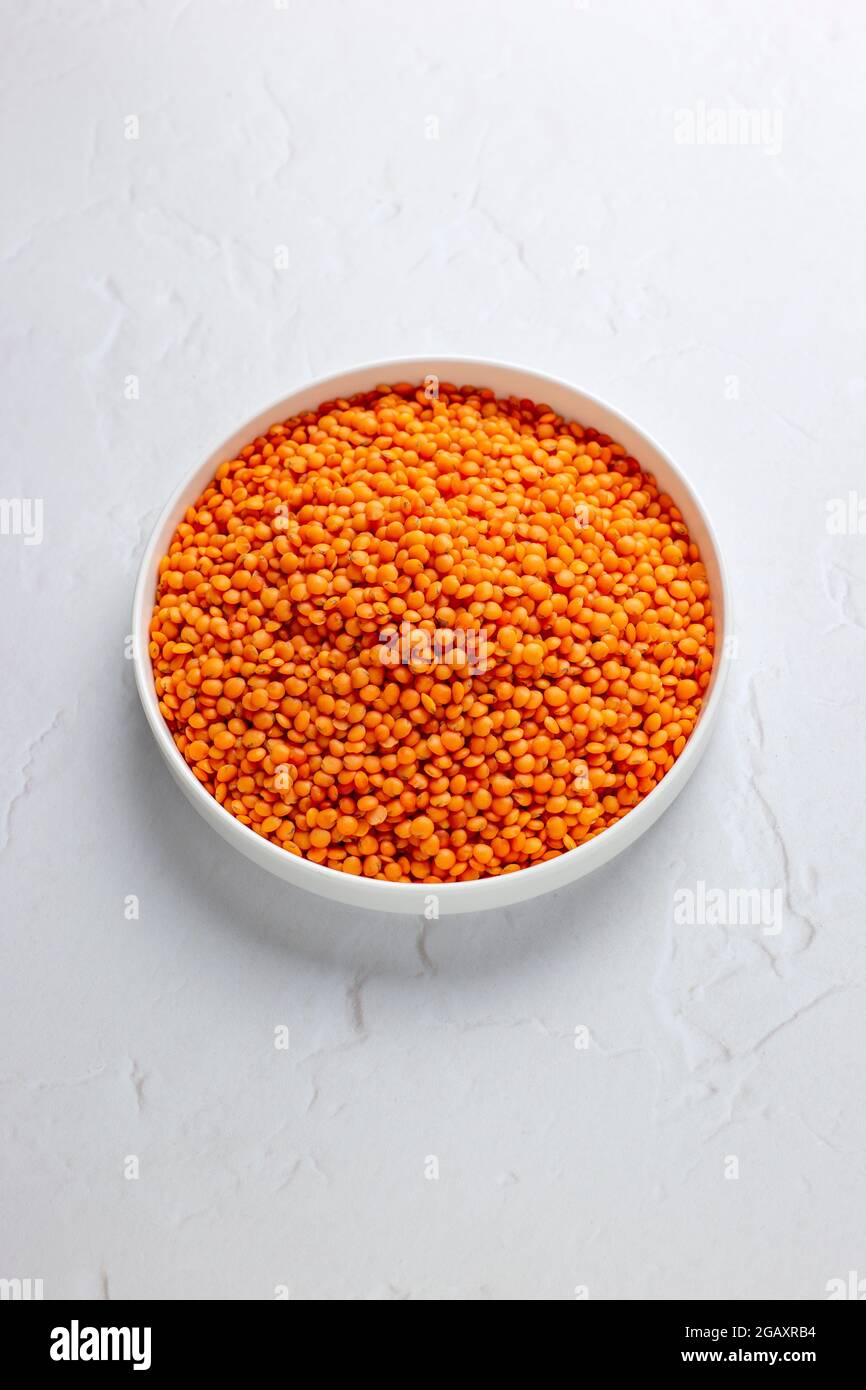 Red Lentils in White Dish on a White Background, Isolated – FOODPIX WHITE - COPYSPACE - ROOM FOR TEXT Stock Photo