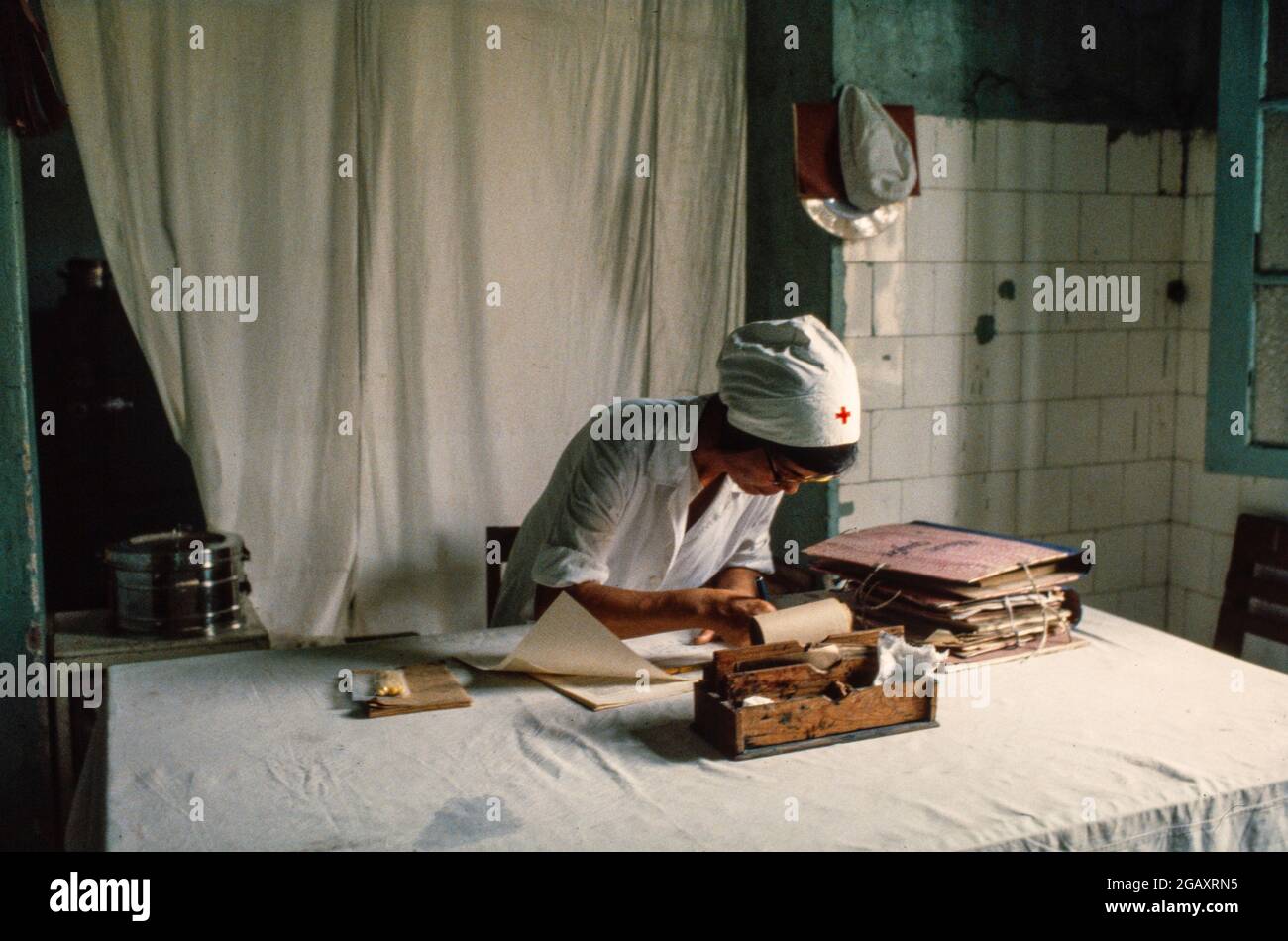 Research staff studying the effects of Agent Orange at the Vietduc Hospital, Hanoi. It was here that Professor Ton Tach Tung's research work uncovered the many birth defects caused by Agent Orange. June 1980 Stock Photo