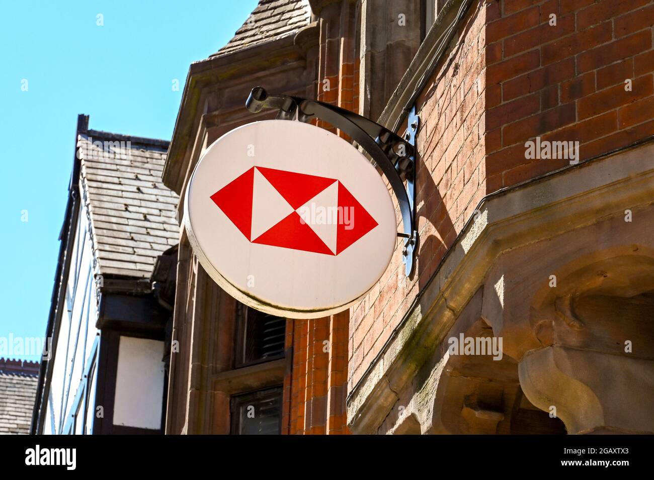 Chester, Cheshire, England - July 2021: Sign above the entrance to the branch of HSBC Bank in the city centre Stock Photo