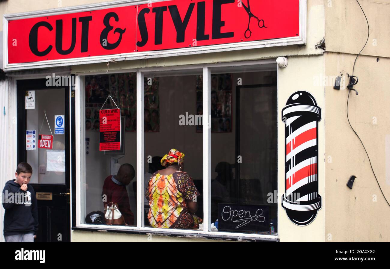 Cut & Style Barber shop, Queen Street Colchester, Essex, Britain July 2021 Stock Photo