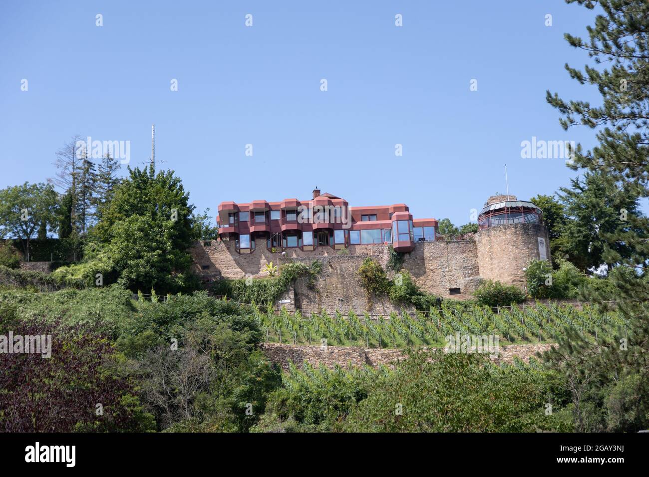 View over the Nahe river to the Kauzenburg castle in Bad Kreuznach, Rhineland-Palatinate, Germany. Stock Photo