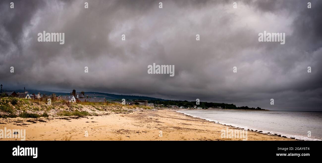 Golspie Beach under a leaden sky. Stock Photo
