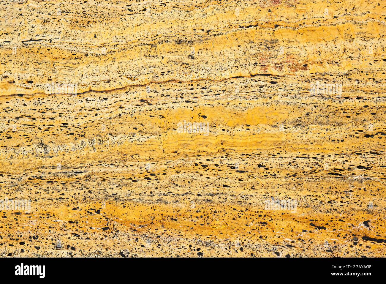 Detail of yellow travertine marble tile texture Stock Photo