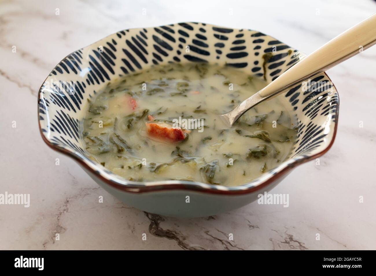 Warm and comforting portuguese soup called caldo verde Stock Photo