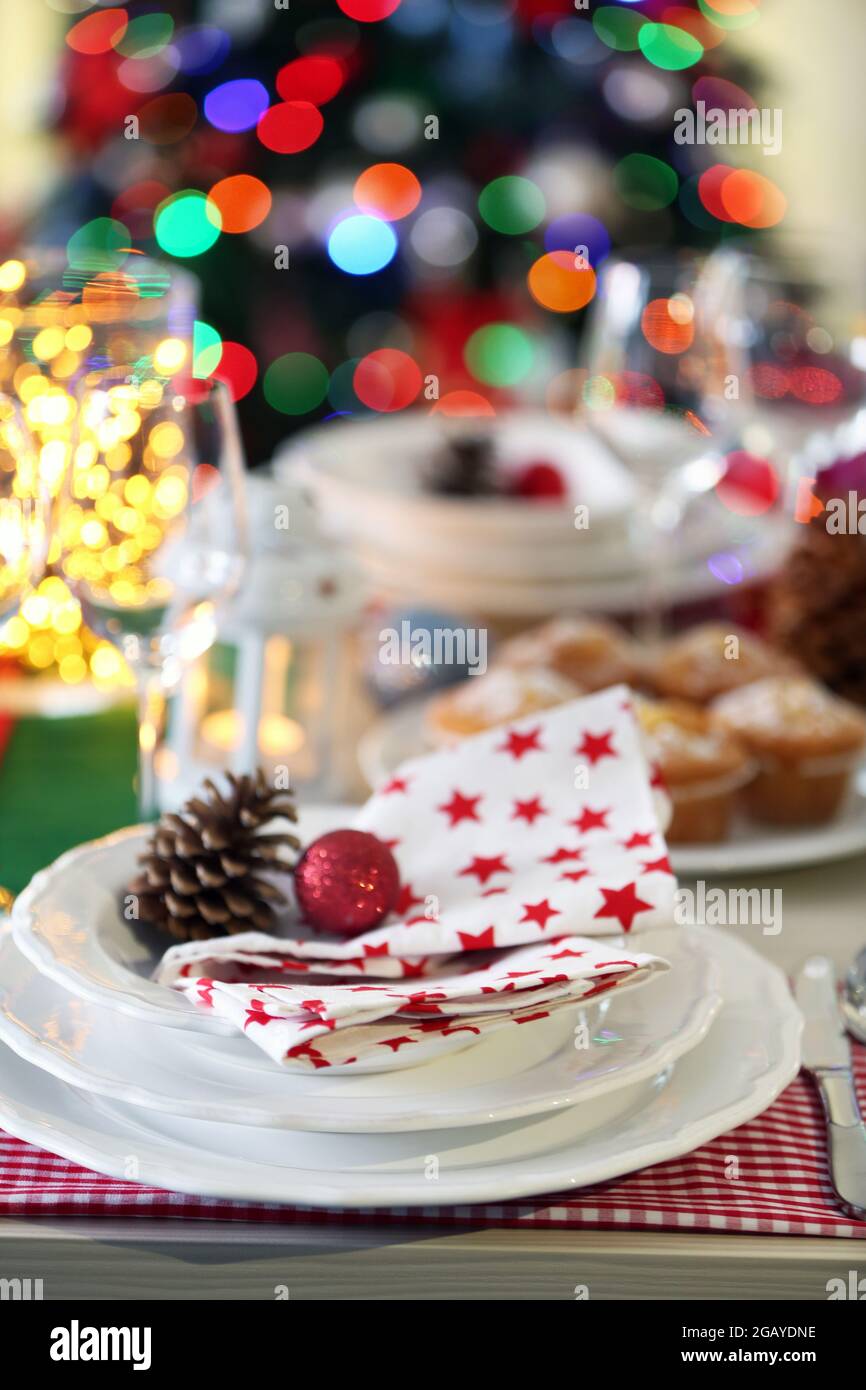 Christmas table setting with holiday decorations Stock Photo - Alamy