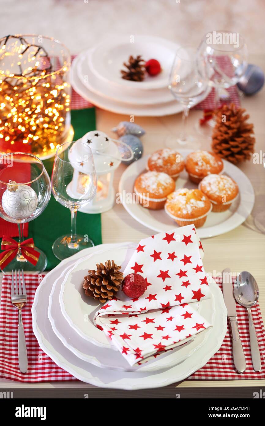 Christmas table setting with holiday decorations Stock Photo - Alamy