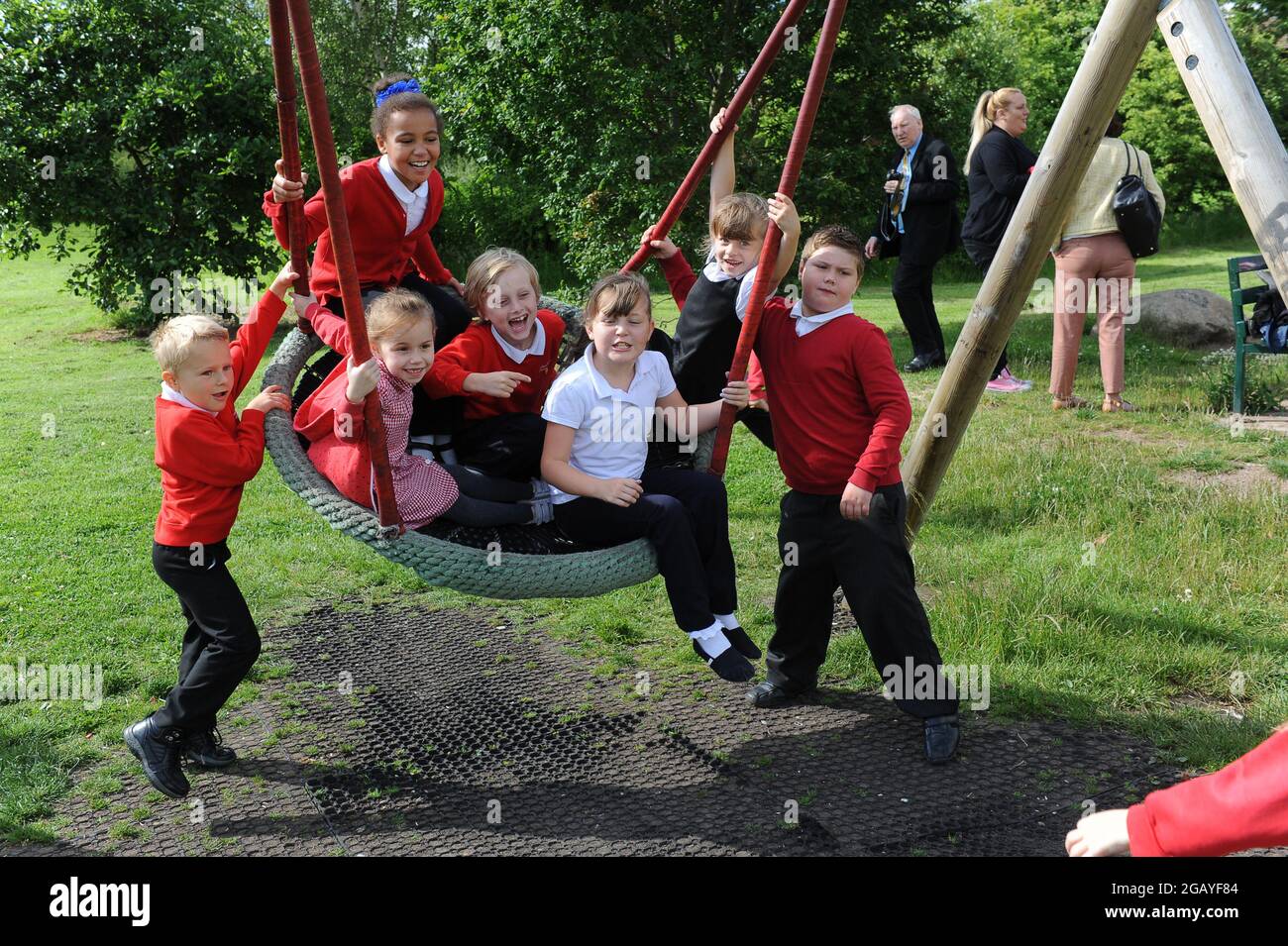 School children playing in the park in West Bromwich, Sandwell, Uk Stock Photo