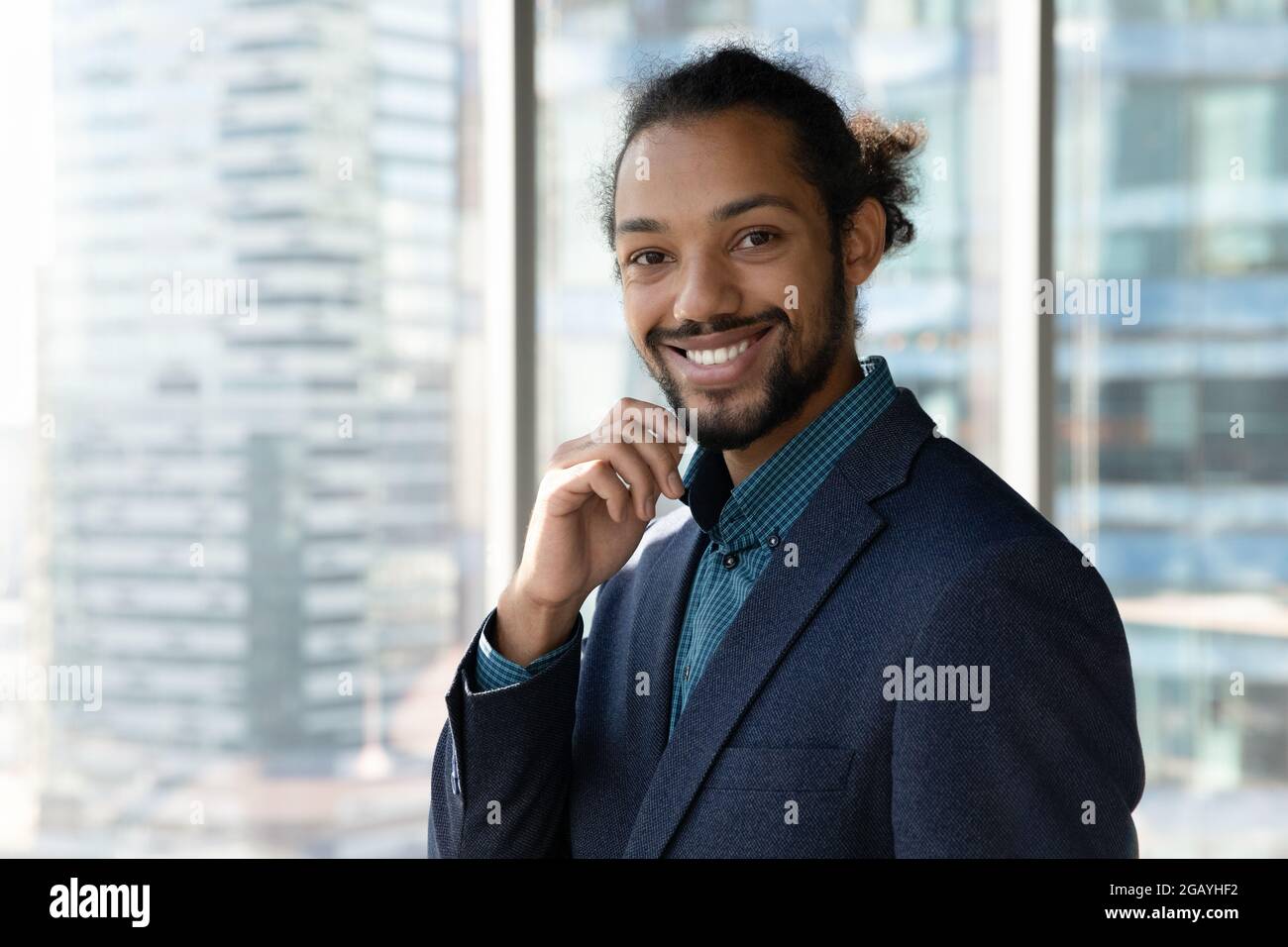 Portrait of confident smiling young african american business man. Stock Photo