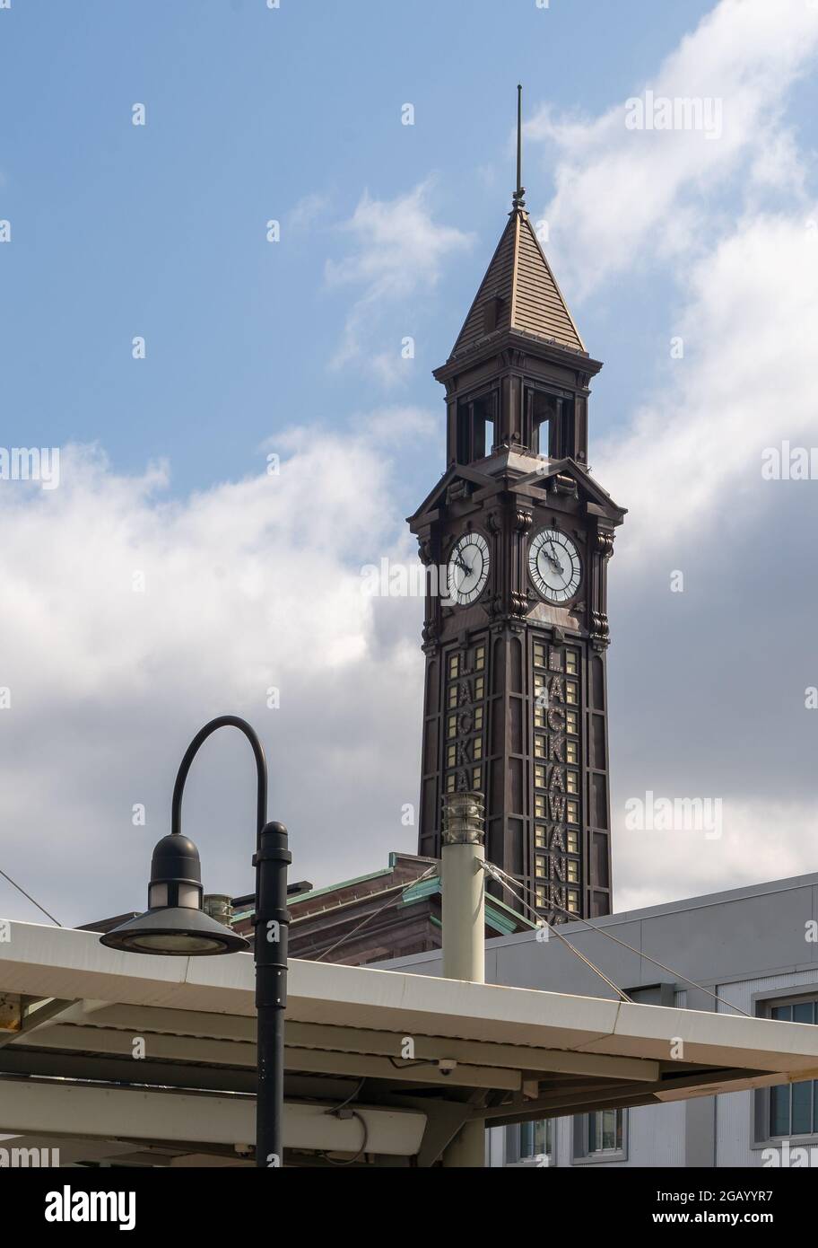 Hoboken, NJ - USA - July 30, 2021: Vertical view of the clock tower of