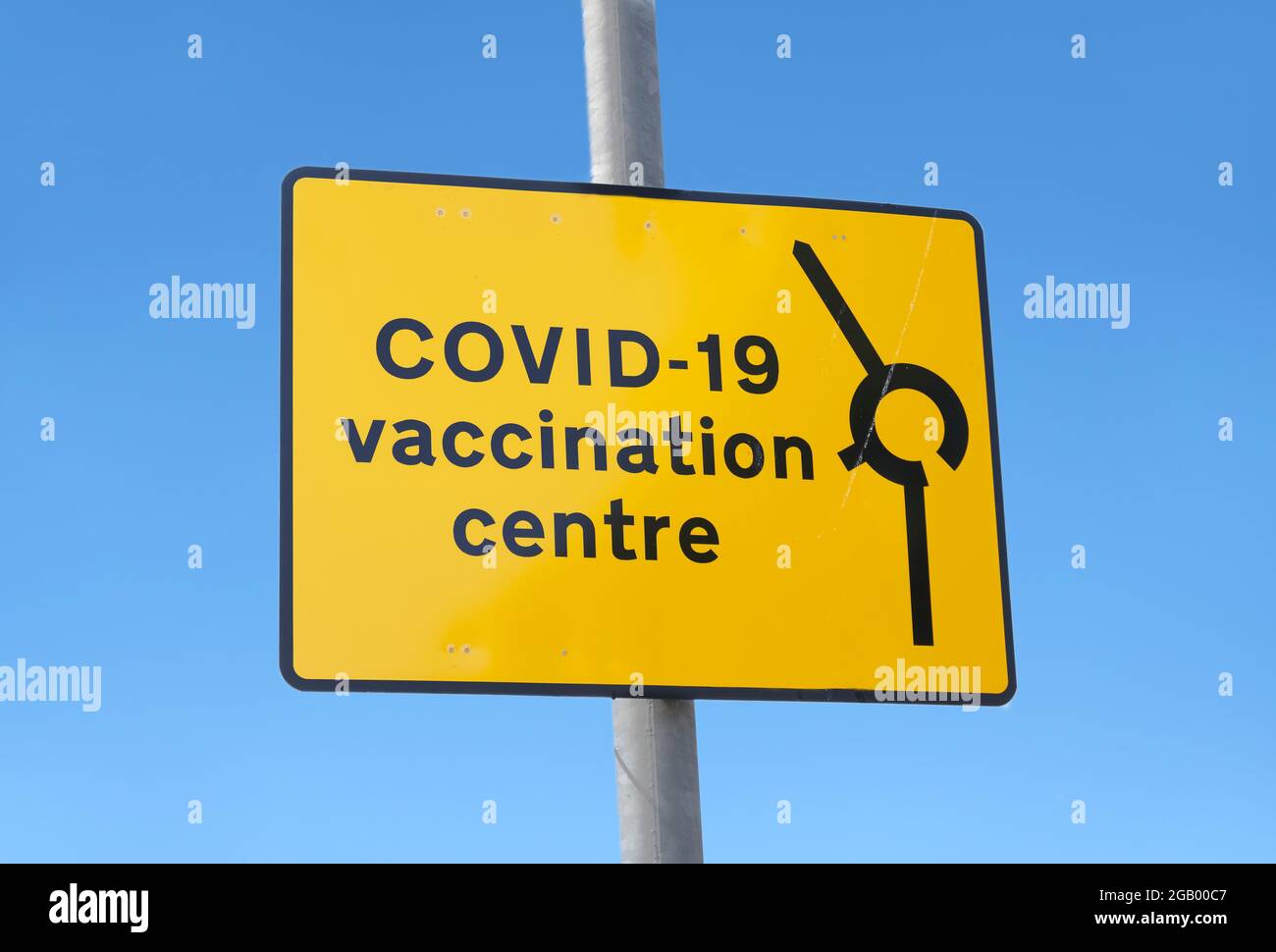 Vaccination medical centre for Covid-19 road sign  Stock Photo