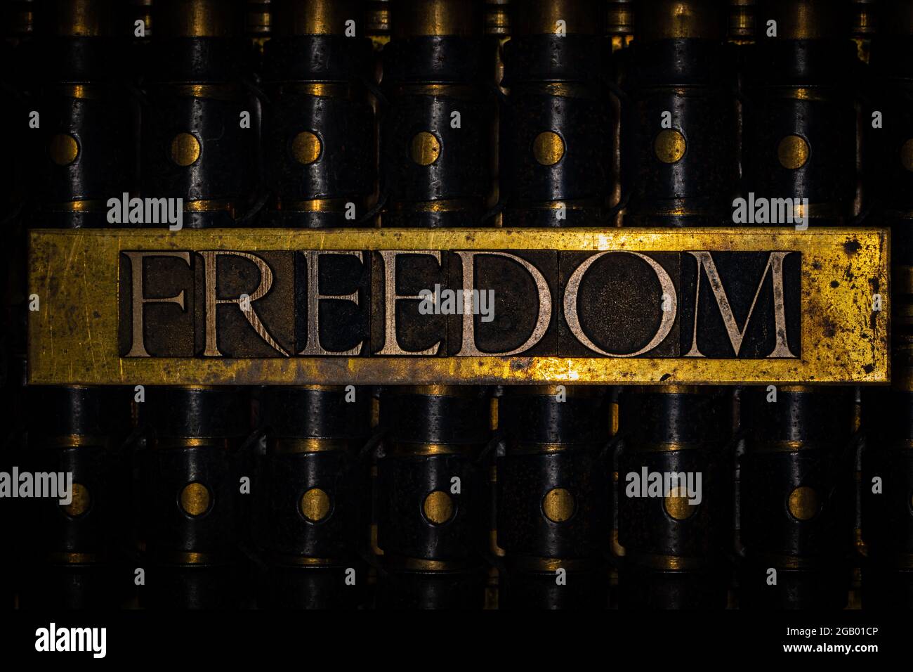 Freedom text on machine gun bullet casings Stock Photo