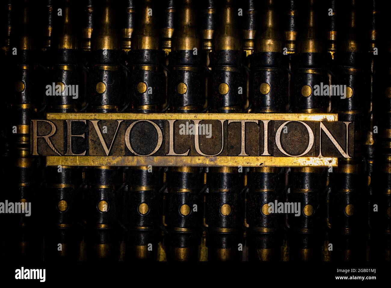 Revolution text message on copper bullet casings Stock Photo Alamy