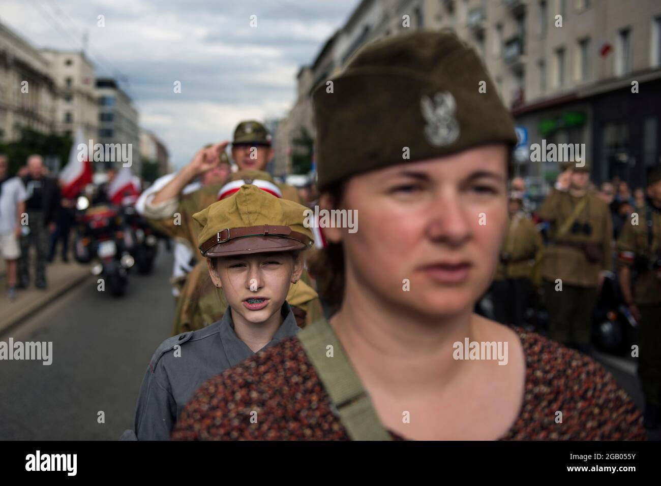 Warsaw, Poland. 01st Aug, 2021. Participants seen dressed up as insurgents during the Warsaw Uprising march.Thousands of people took part in a march organised by the National Radical Camp (ONR) and other nationalist organizations to commemorate the 77th anniversary of the Warsaw Uprising (Powstanie Warszawskie). Credit: SOPA Images Limited/Alamy Live News Stock Photo