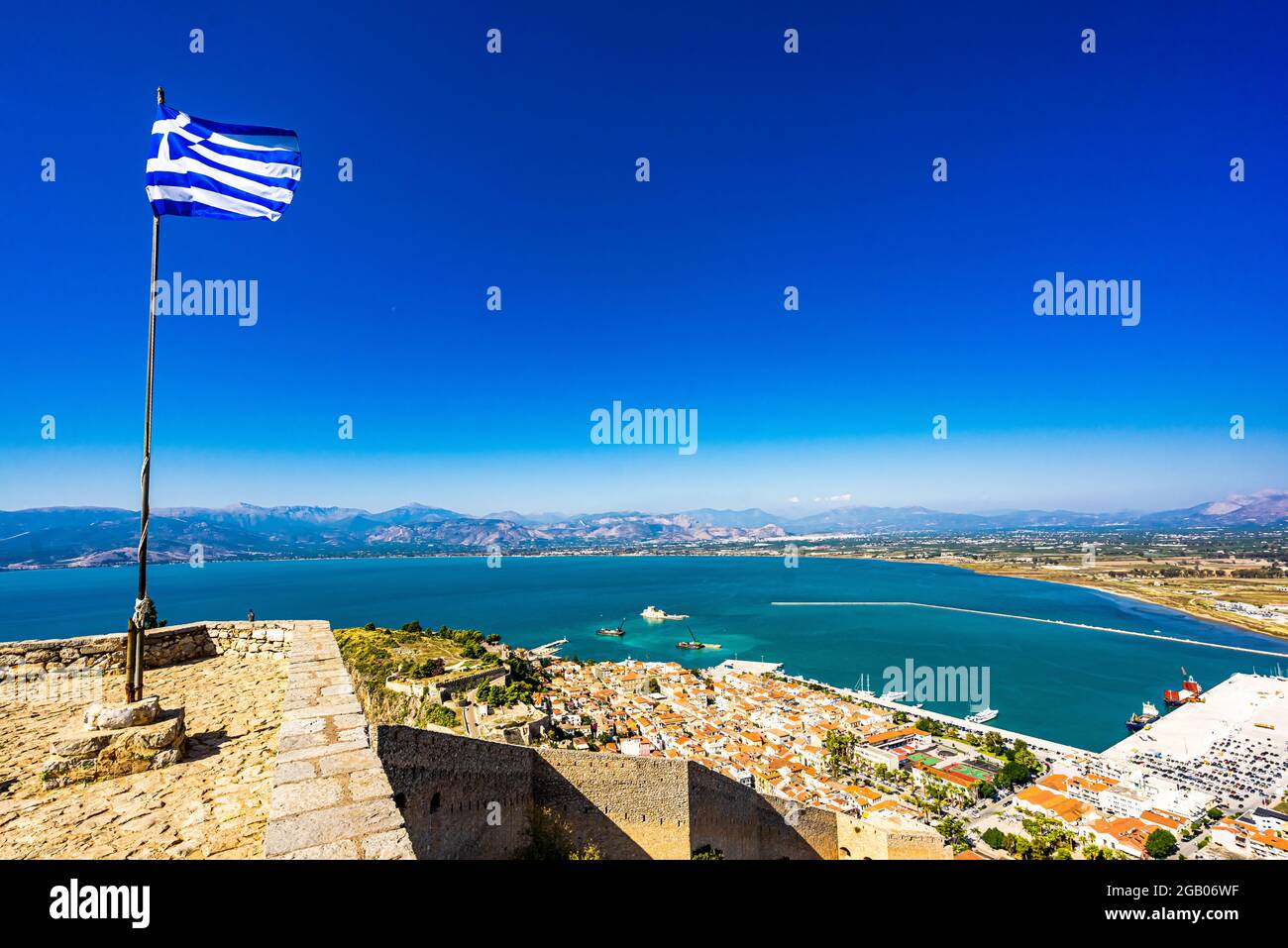 Greek Flag waving on Palamidi Fortress in Nafplion, Argolis - Greece Stock Photo