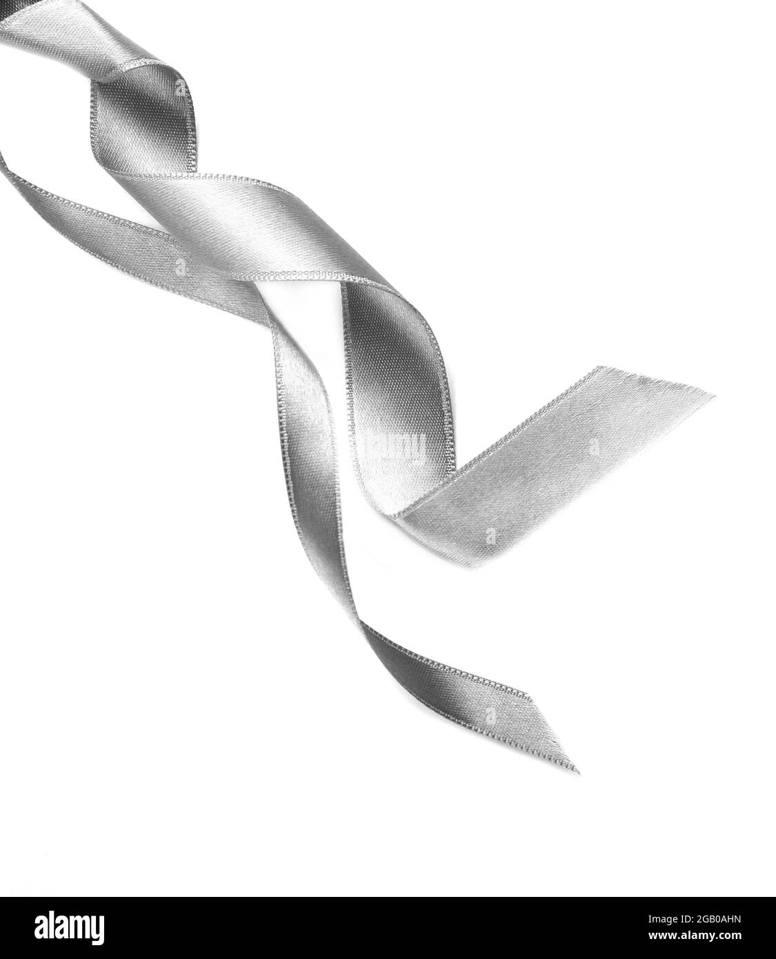 Silver silk curly ribbon isolated on white background Stock Photo - Alamy