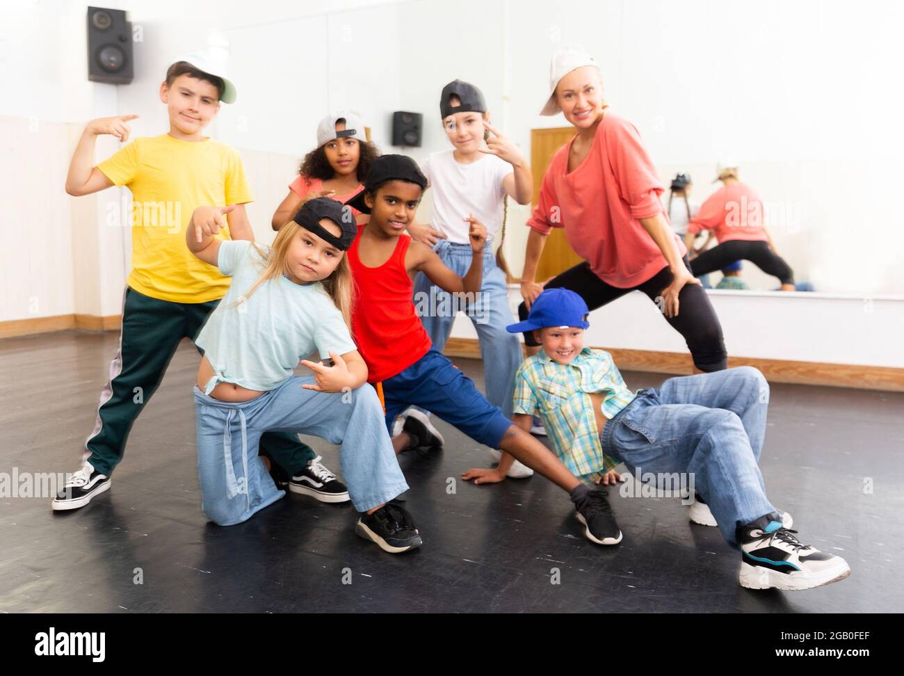 Kids hip hop dancers posing in studio Stock Photo - Alamy