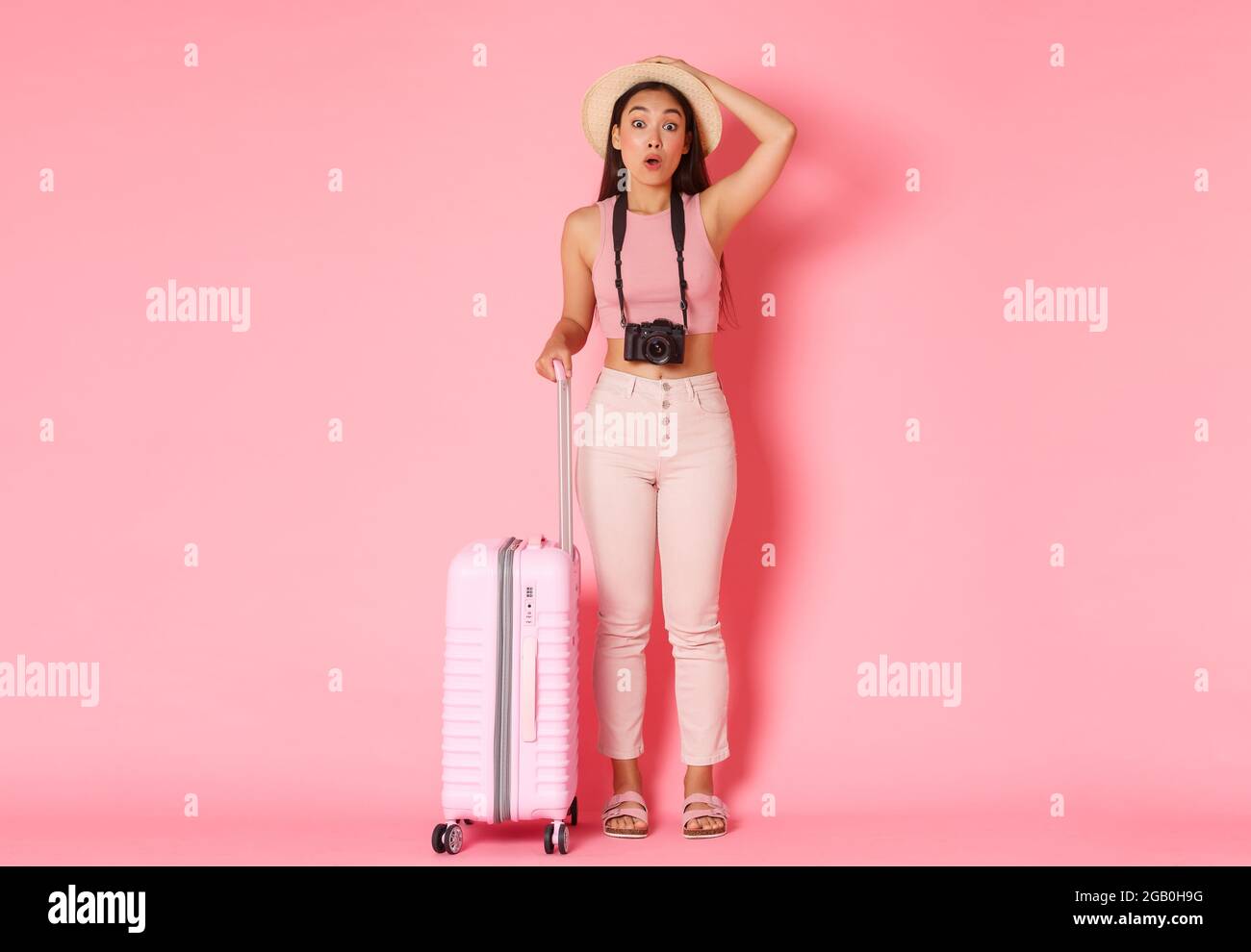 Tourism, summer vacation, holidays abroad concept. Full length of dreamy and amused asian girl