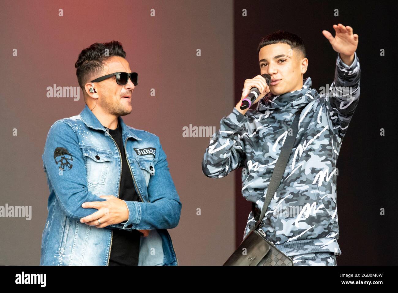 Peter Andre with son Junior Andre performing on stage at the Fantasia music concert in Maldon, Essex, UK soon after lifting of COVID restrictions Stock Photo