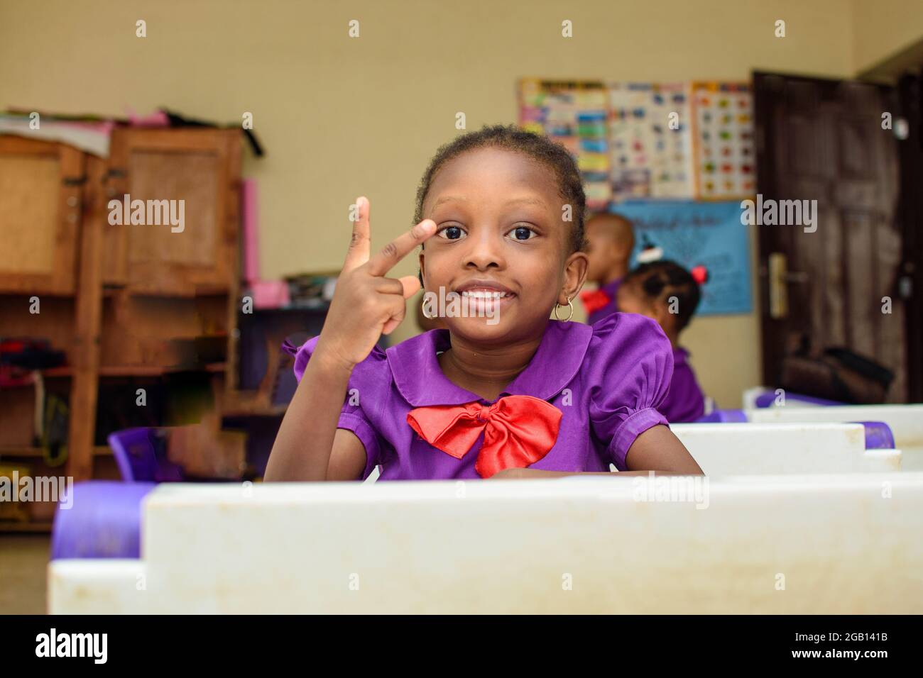 African school girl uniform hi-res stock photography and images - Alamy