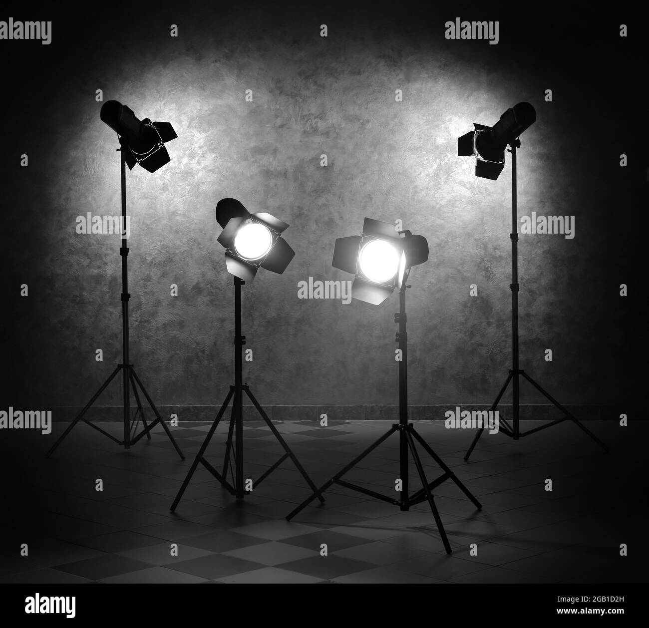 Lighting equipment on grey wall Stock Photo Alamy