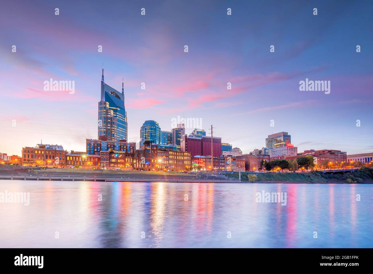 Nashville, Tennessee downtown skyline with Cumberland River in USA at sunset Stock Photo