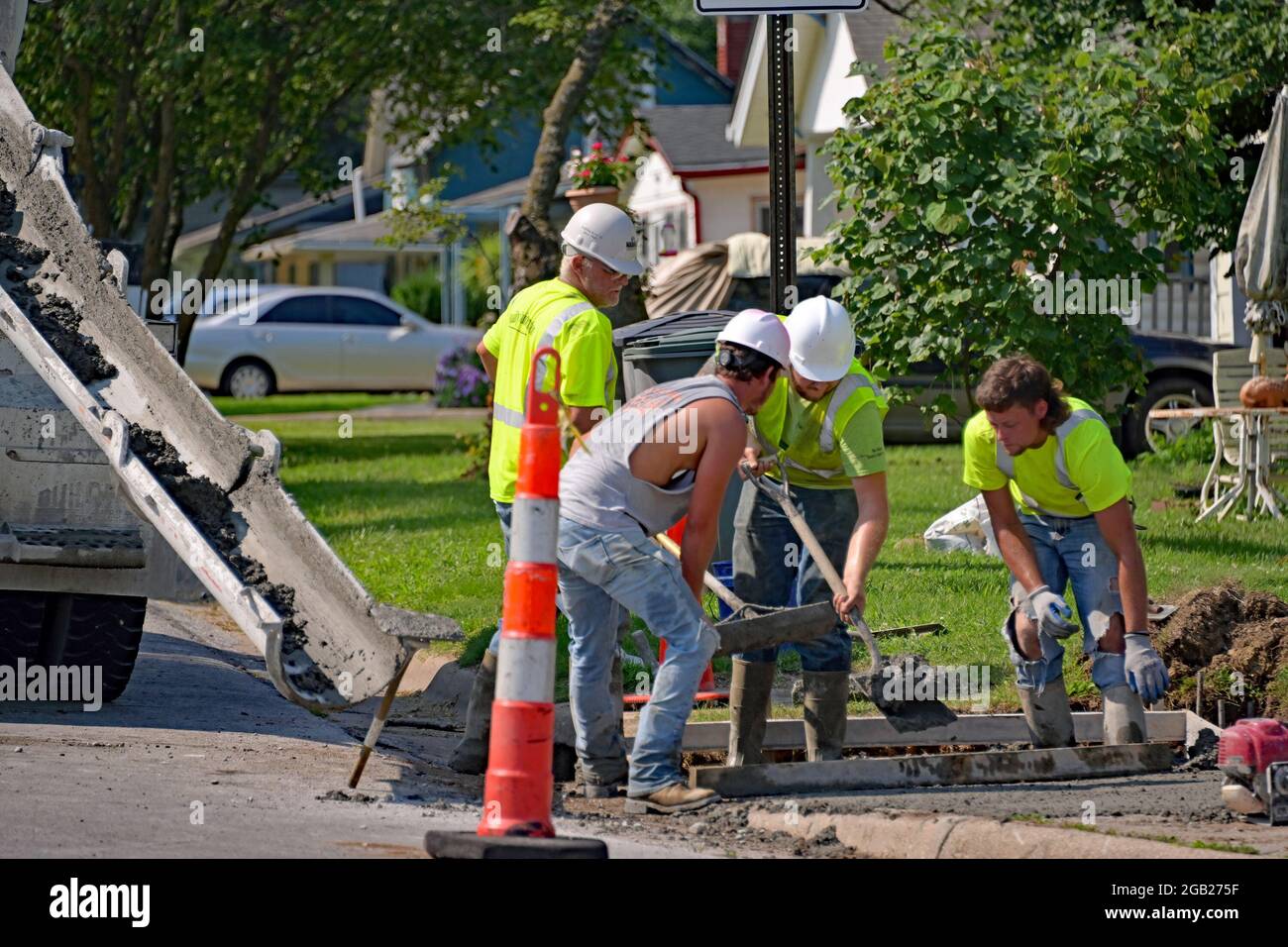 Concrete contractors working for the City of Emporia pour new concrete
