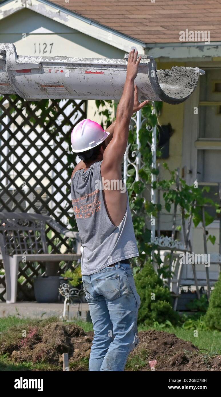 Concrete contractors working for the City of Emporia pour new concrete
