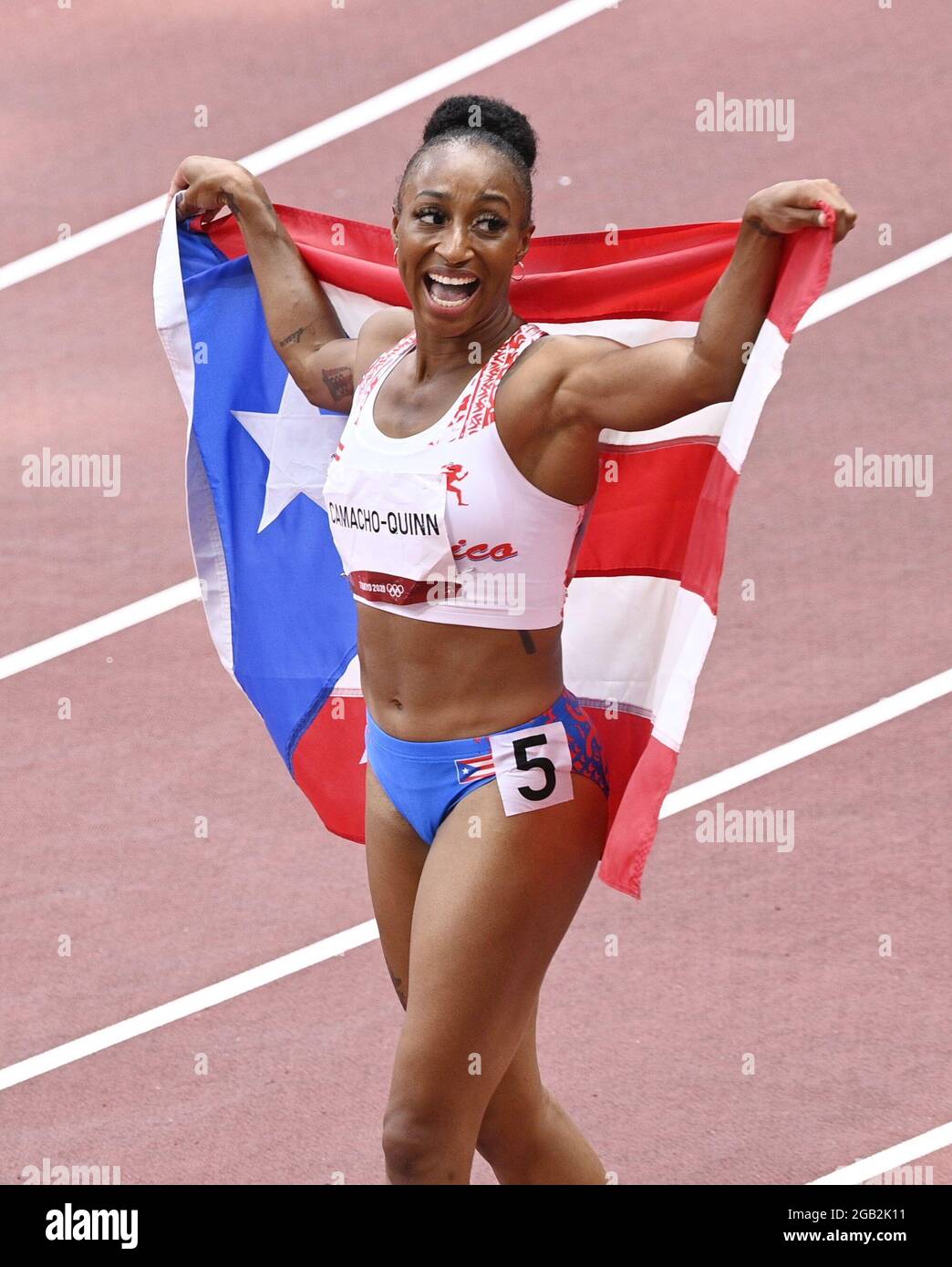 Jasmine CamachoQuinn of Puerto Rico celebrates after winning gold in