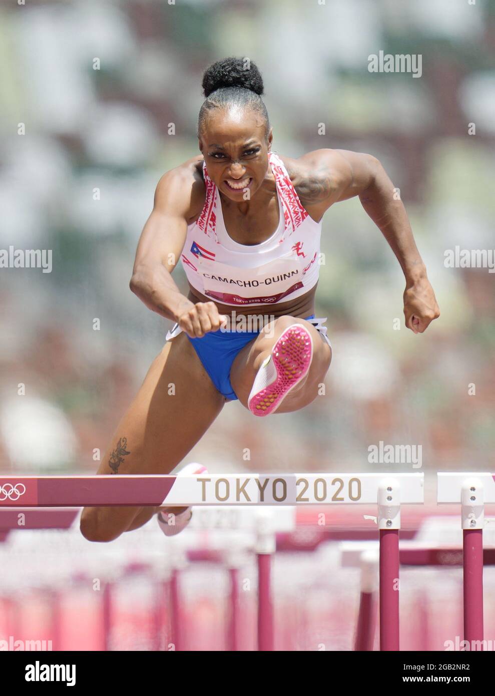 Jasmine CamachoQuinn of Puerto Rico competes in the women's 100meter