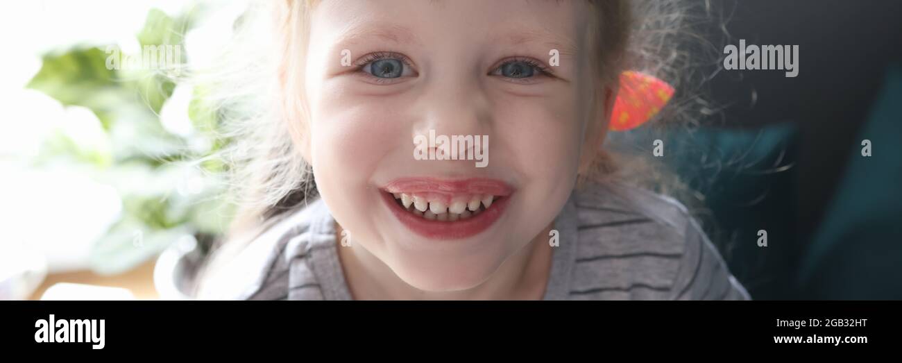 Portrait of little smiling beautiful girl at home Stock Photo - Alamy