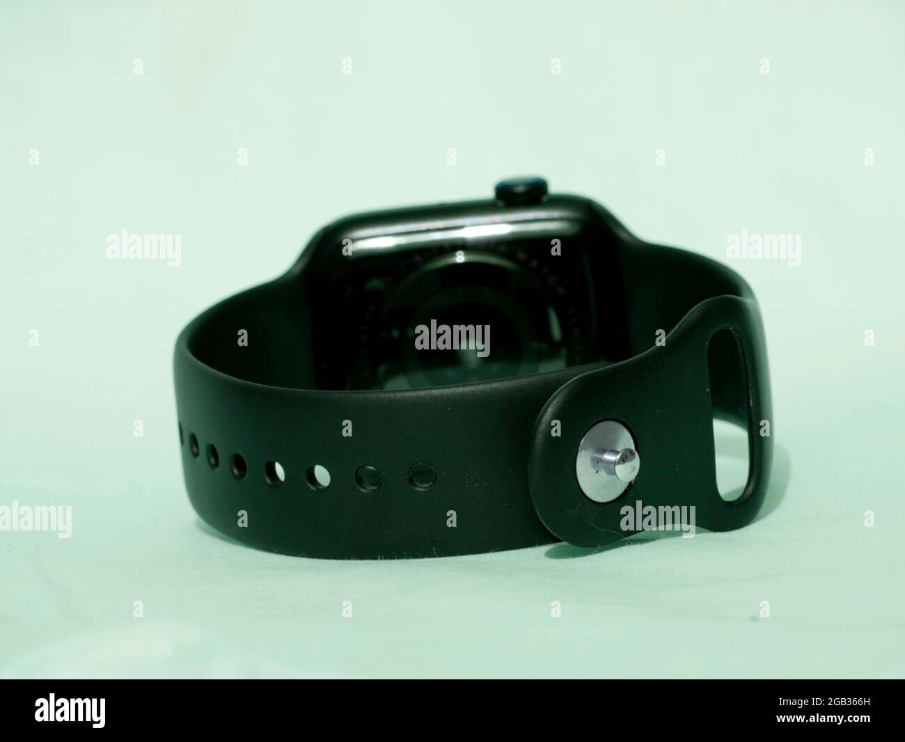 Black color electronic digital smart watch presented on white