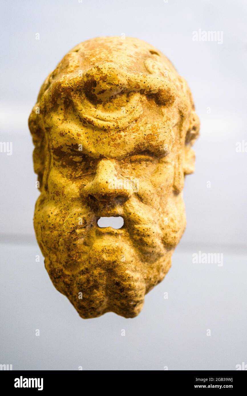 Clay mask (III-II cent BC) - Tarquinia National Archaeological Museum, Italy Stock Photo