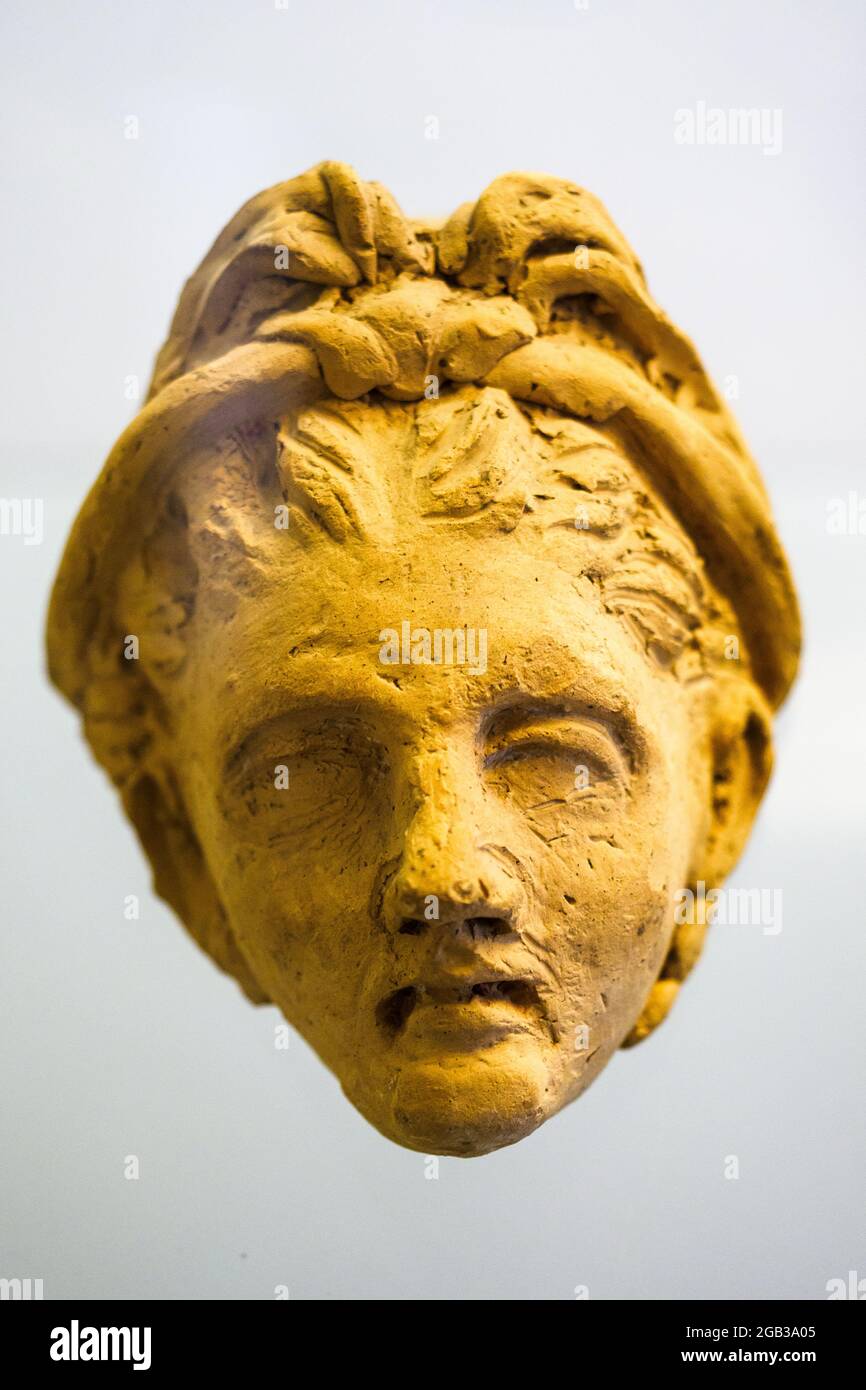 Clay mask (III-II cent BC) - Tarquinia National Archaeological Museum, Italy Stock Photo
