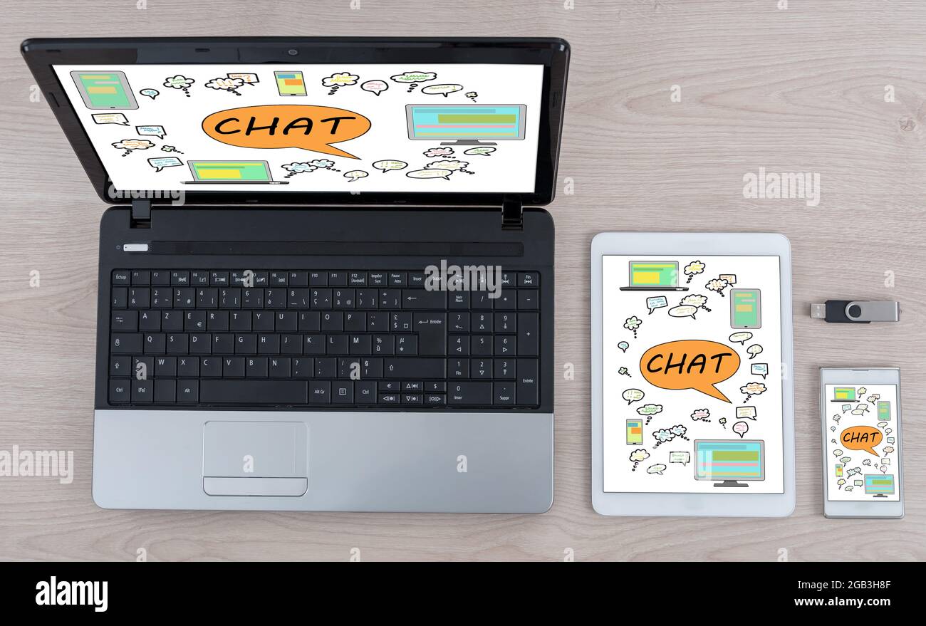 Chat concept shown on different information technology devices Stock Photo