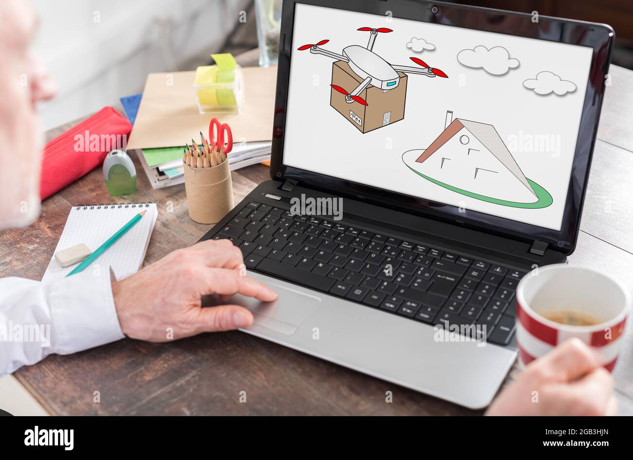 Drone delivery concept shown on a laptop screen Stock Photo