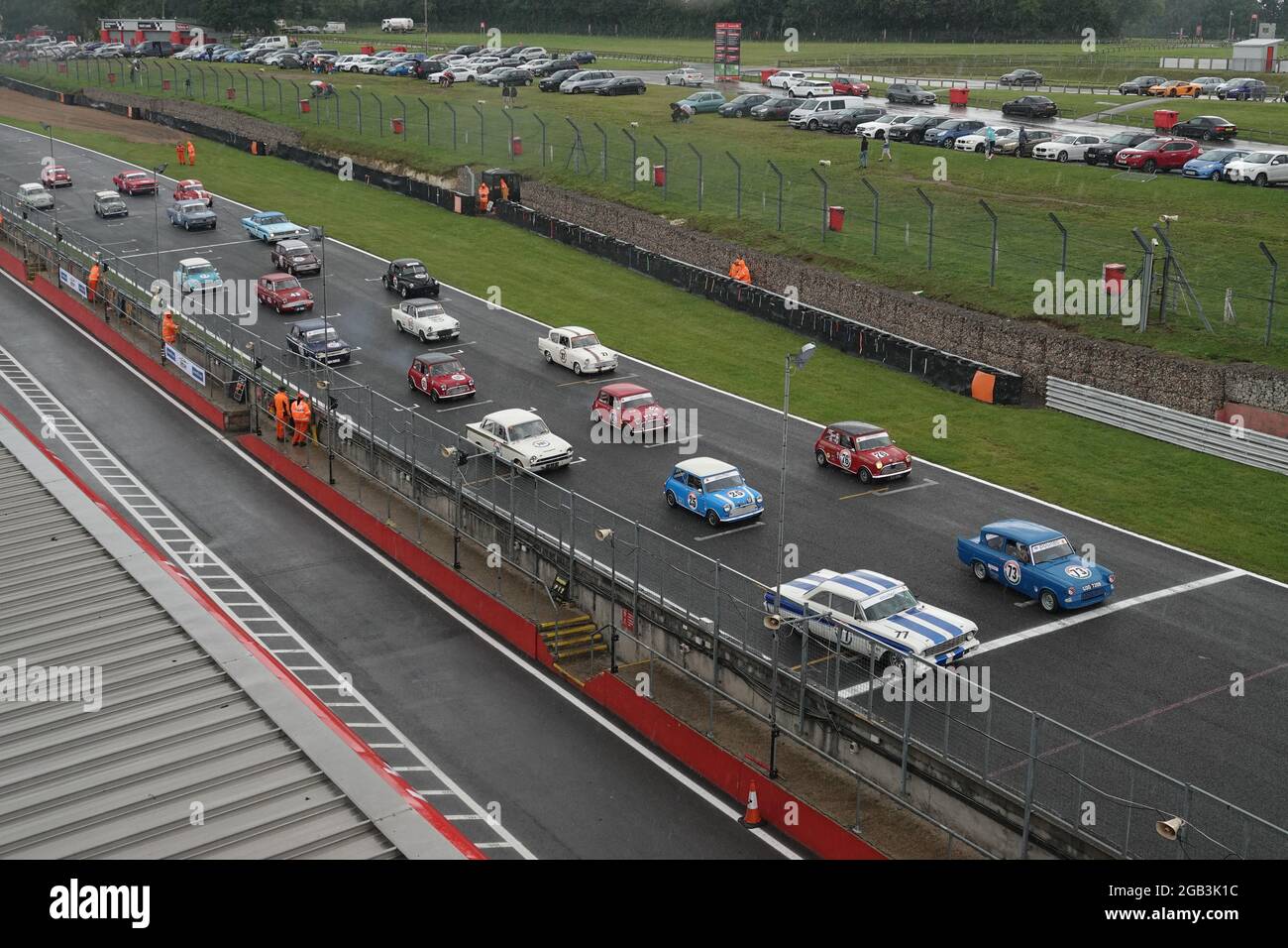 Brands Hatch, Kent, UK. 1st Aug, 2021. Classic, old and veteran historic saloon cars Competing in the BARC races at Brands Hatch in the changeable weather. Credit: Motofoto/Alamy Live News Stock Photo