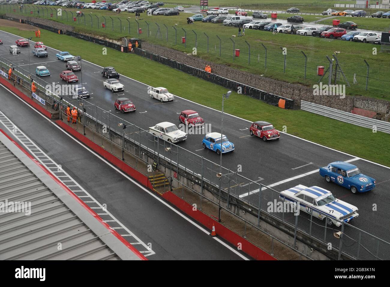 Brands Hatch, Kent, UK. 1st Aug, 2021. Classic, old and veteran historic saloon cars Competing in the BARC races at Brands Hatch in the changeable weather. Credit: Motofoto/Alamy Live News Stock Photo