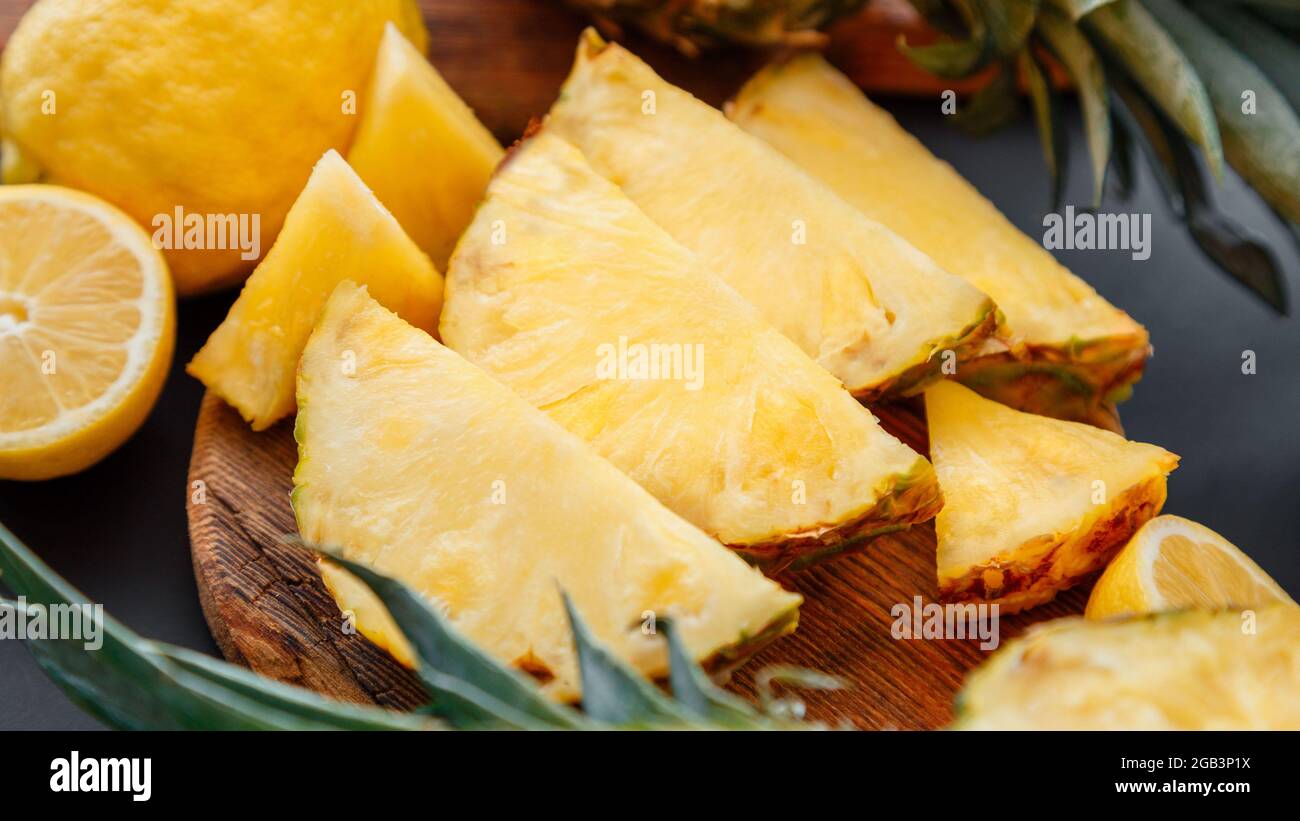 Pineapple on cutting board. Summer fruit Sliced pineapple slicing ...