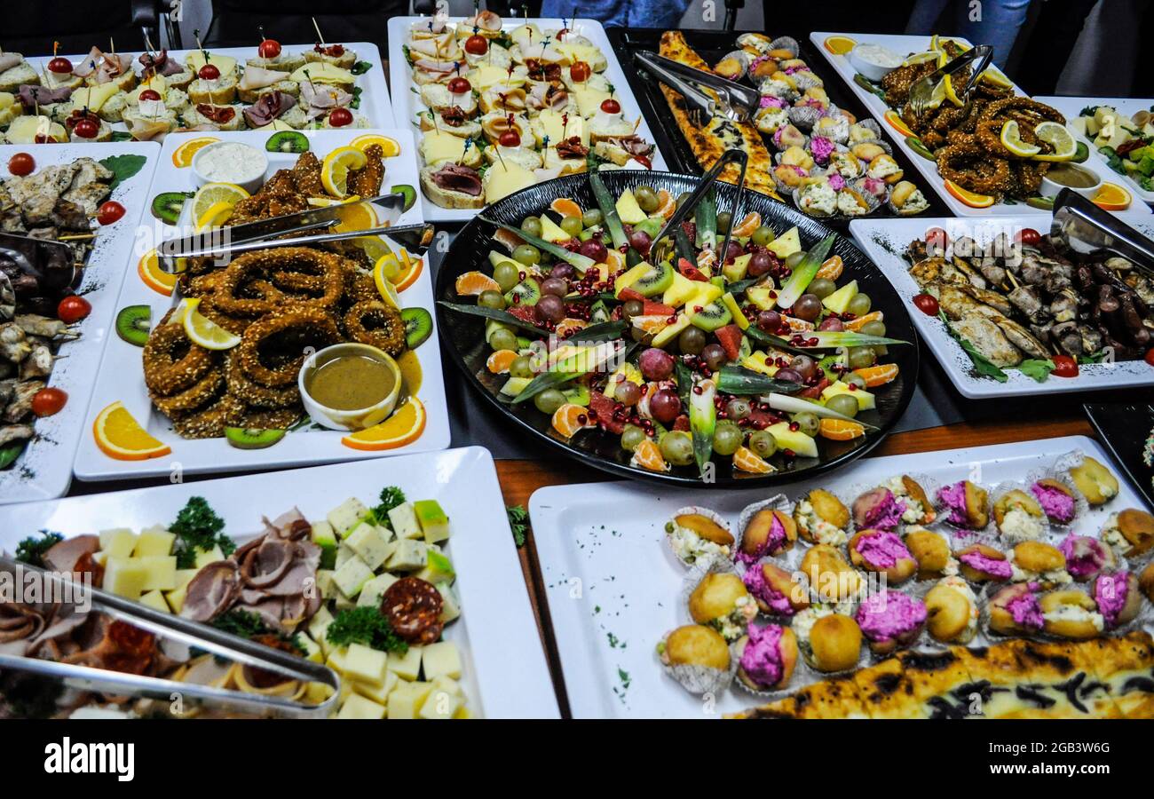 Catering buffet table with a delicious food Stock Photo - Alamy