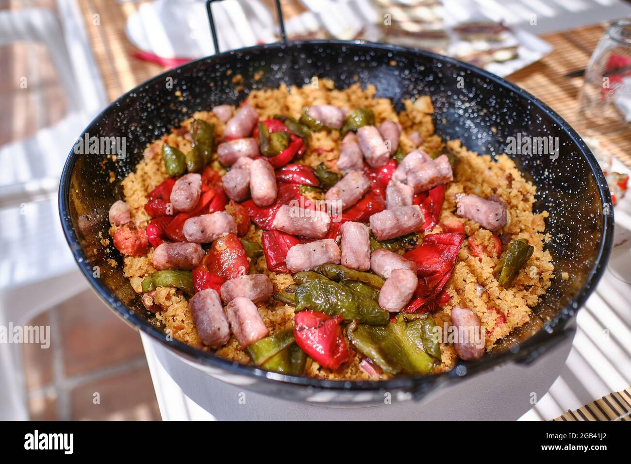 Migas con chorizo, a traditional Spanish recipe made with breadcrumbs and chorizo sausage Stock Photo