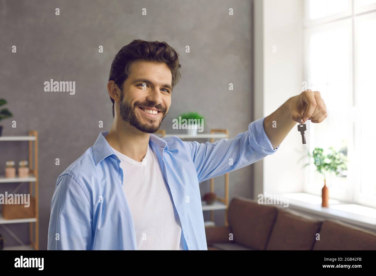 Happy home one young man portrait hi-res stock photography and images ...