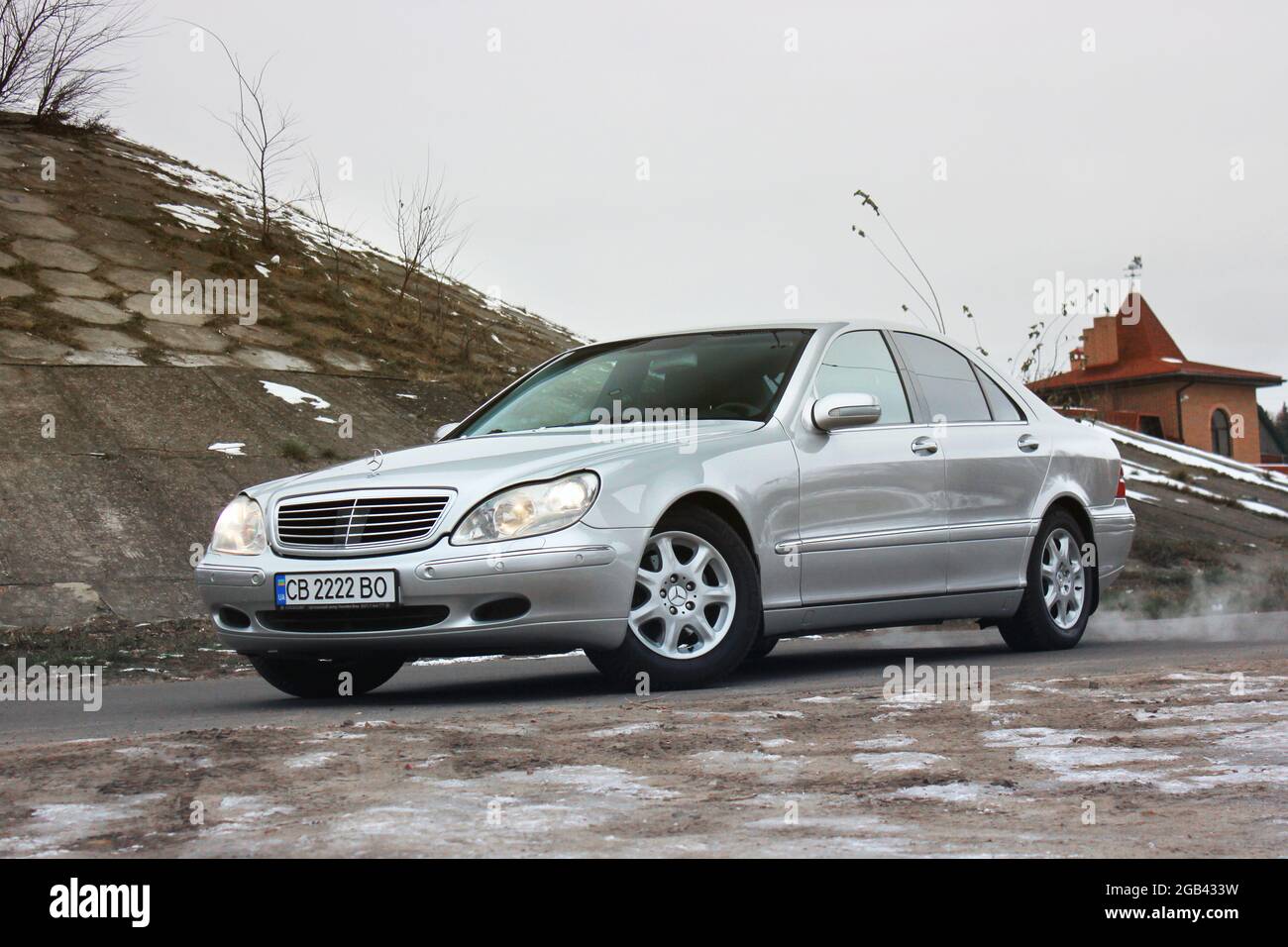 Chernihiv, Ukraine - November 22, 2018: Mercedes-Benz S-Class in winter against the background of houses Stock Photo