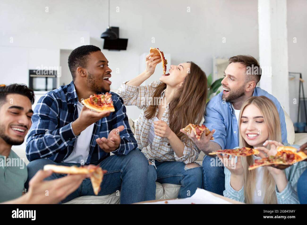 Friends Eating Pizza Together Sharing Platters Stock Photo 1038714430