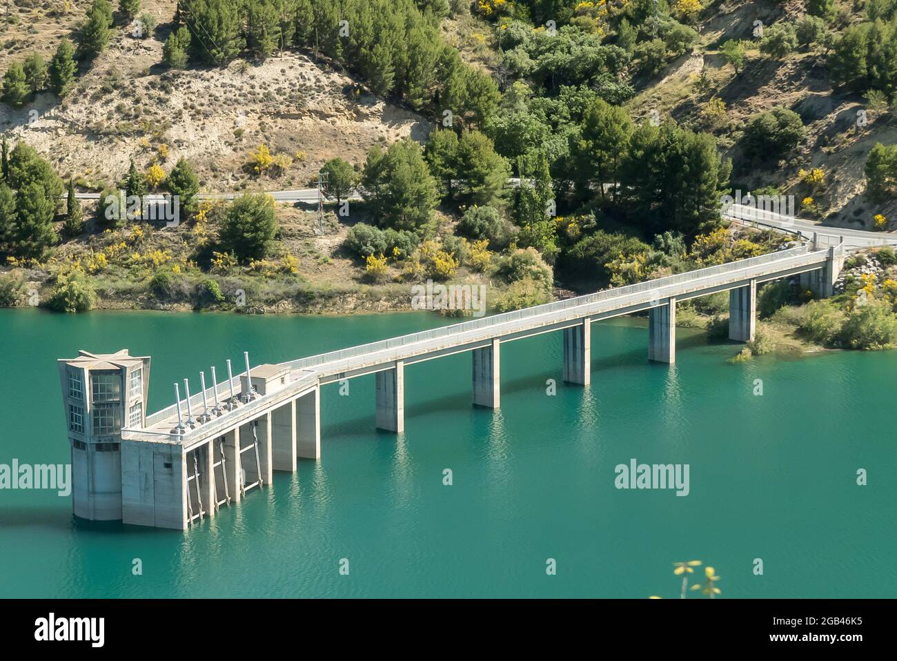 Granada in Spain: the turquoise waters of the Embalse de Canales. Stock Photo
