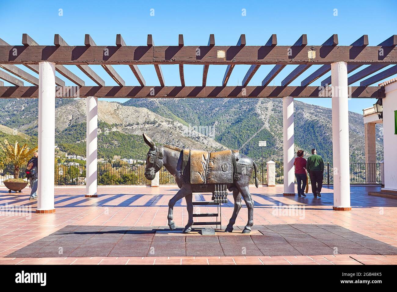 Donkey Statue. Symbol of Mijas village. Andalusia, Costa del Sol. Spain - Donkey taxi landmark in Mijas white-washed spanish village. Lot of donkey ta Stock Photo