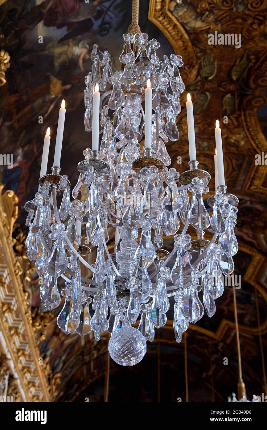 Interior of Chateau de Versailles (Palace of Versailles) near Paris. Crystal chandelier detail Stock Photo