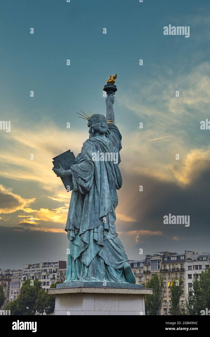 Statue of Liberty in Paris, France - Dramatic sunset Stock Photo
