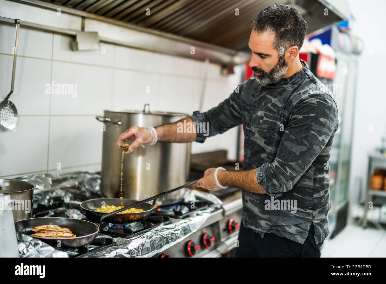 Professional kitchen equipment chef hi-res stock photography and images ...